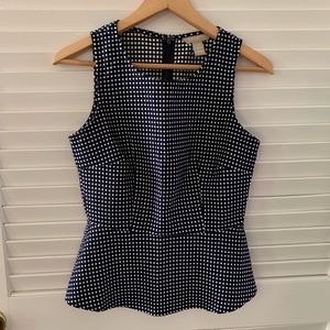 Peplum navy polka dot top